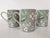 Offering a beautiful set of three porcelain mugs by Fitz And Floyd in the pattern "Chanson des Fleurs". These vintage mugs...