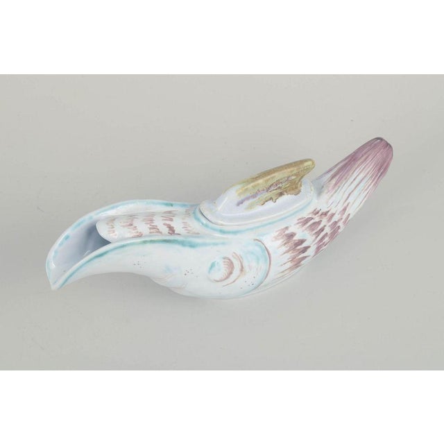 Thorvald olsen for aluminia sauce bowl, mid-20th century. Figurative sauce bowl shaped as a bird, executed in faience with...