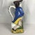 19th Century Antique Ceramic Toby Jug, Colonial Man Sitting on Keg. Wonderful bright colors of yellow, blue, and green....