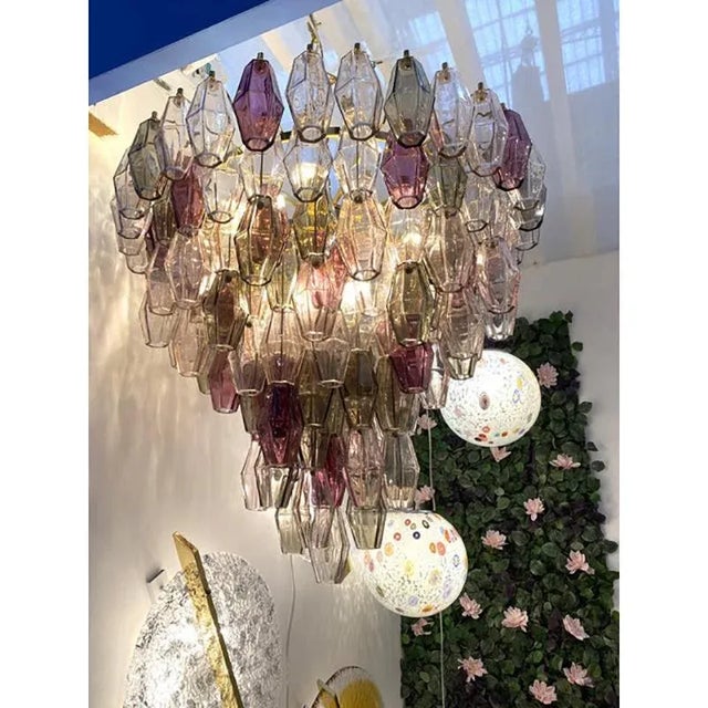 Luxury elegant chandelier in gold 24k bath of metal frame and "poliedri" in murano glass. pink, violet, fumè and wine:...