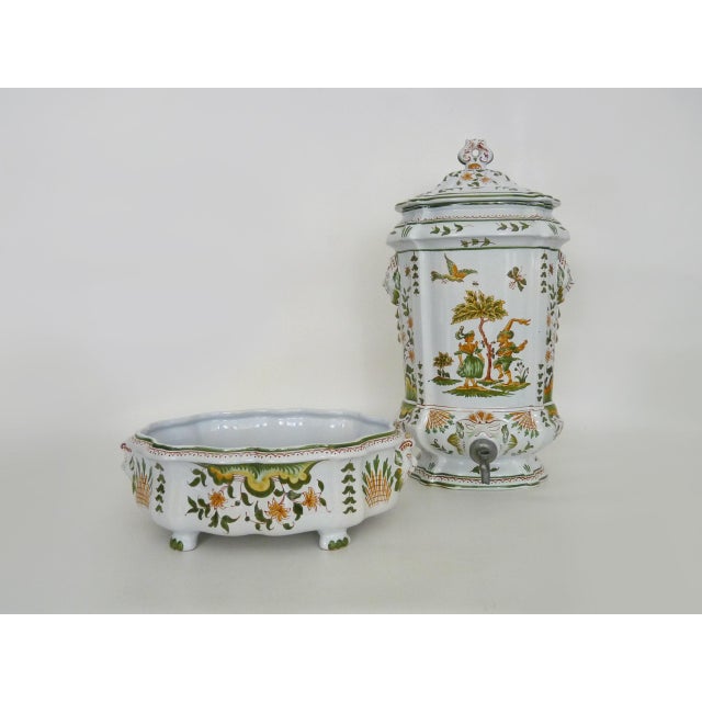 Wall-mounted fountain with a Moustiers earthenware basin, hand-painted, 1970s Wall-mounted fountain with a Moustiers...
