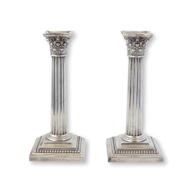 A stunning pair of antique Gorham sterling silver candlesticks, beautifully crafted in a classical Corinthian column...