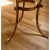 Offered is a vintage regency style accent table. This piece features a thick round piece of glass set atop a gold painted...