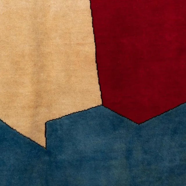 Rug, or tapestry, inspired by Serge Poliakoff, in shades of blue, red, beige and black. Contemporary craftsmanship. This...