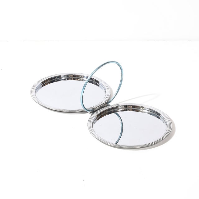 This striking Art Deco folding tray, crafted by Manning Bowman in America circa 1935, is an enduring example of the...