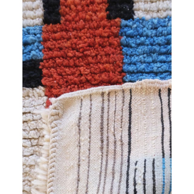 Colorful Moroccan Rug – Handwoven Wool with Graphic Pixel Patchwork Design This colorful Moroccan rug is a one-of-a-kind...