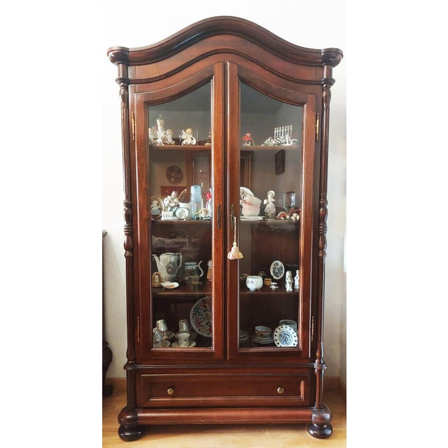 Vintage Glass and Walnut Display Cabinet, 1950s, in Good conditions. Designed 1950 to 1959 This piece is attributed to the...