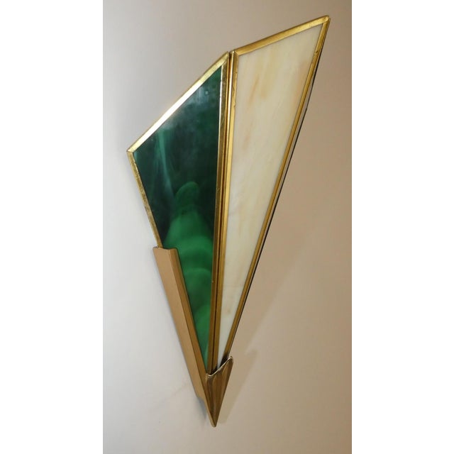 Tiffany Style wall lamps attributed to Glashütte Limburg… a playful example of rebellion against the elegant minimalism of...