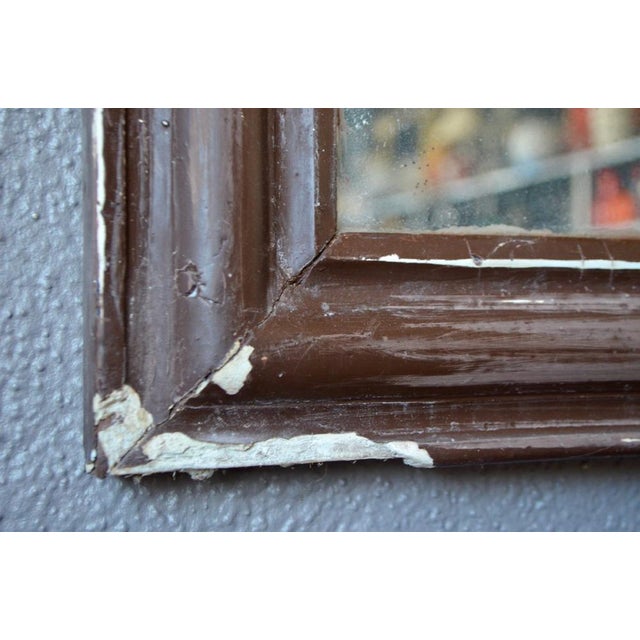 Intense and deep brown patina, the difference with the soft and round lines of this Louis Philippe mirror is total. We...