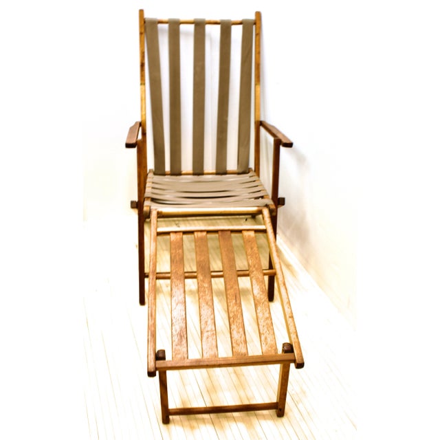 Vintage steamer ship chair in the style of the 1st class deck chairs. Folding chair is adjustable to 3-positions. Teak...