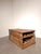A distinctive storage chest crafted from solid teak, combining generous storage space with an integrated wine rack. The...