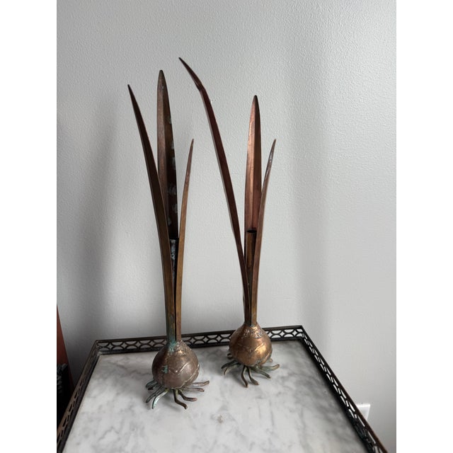 This pair has gorgeous copper toning with verdigris pagination. Imitation vases are not the same. These are the originals...