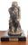 This bronze reproduction of Rodin’s *The Thinker* is one of the most iconic works in the history of modern sculpture. A...