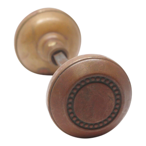 Brass Pair of Beaded Concentric Gem Door Knobs
