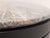 Premium sculptural coffee table with Quartzine stone top and stained fumed oak base. Features a distinctive rounded-square...