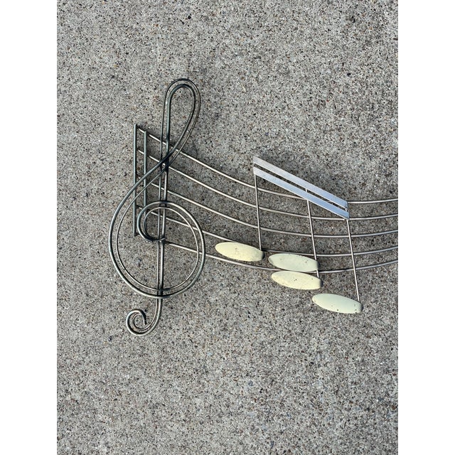1990 Curtis Jeré Gold Tone Brass Massive Rhapsody Music Notes Wall Sculpture 61” Good vintage condition. No damage. Length...