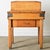 This French, early 20th century pine butcher block table is characterized by warm color and patina to be a welcome...