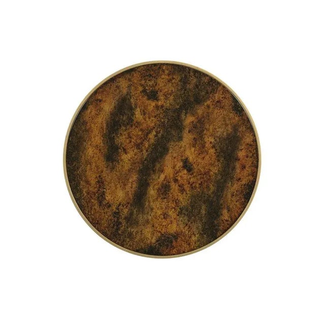 A terrific small table for drinks, with a rounded ash veneered top over an angular patterned architectural support column....