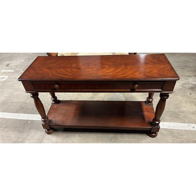 Flame mahogany top: the bookmatched, swirling grain pattern on the top is classic “flame” or “crotch” mahogany veneer — a...