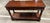 Flame mahogany top: the bookmatched, swirling grain pattern on the top is classic “flame” or “crotch” mahogany veneer — a...