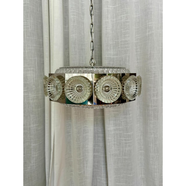 Metal ceiling lamp with crystal elements, Carl Fagerlund for Orrefors, Sweden, 1960s. The lamp consists of a metal casing...