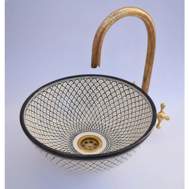 Black white ceramic Sink Bowl, a striking piece of craftsmanship that seamlessly blends Mid-Century charm with modern...