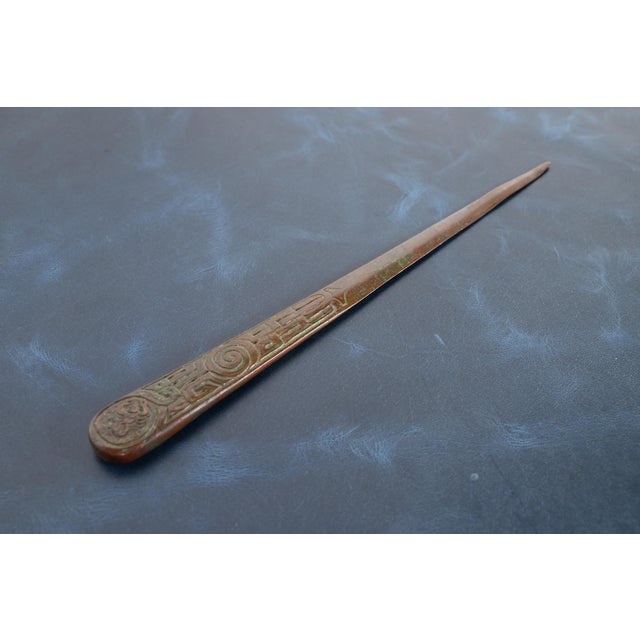 A gorgeous antique Arts and Craft or Art Deco period bronze "Zodiac" pattern letter opener By Tiffany Studios (signed on...