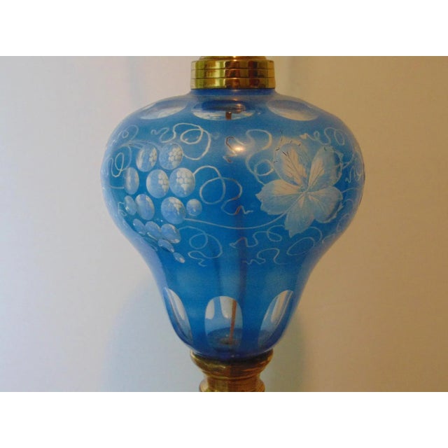 Whale oil style lamp, 19th century design made in early 1900’s. Blue cut to clear glass pear shaped font, grape and leaf...