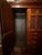 Late 19th Century Victorian Carved Walnut Triple Compactum Wardrobe With Beveled Mirror Doors For Sale - Image 9 of 9