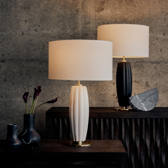 The Crocus Ceramic Table lamp balances clean lines with subtle texture for a look that's refined but approachable. A...
