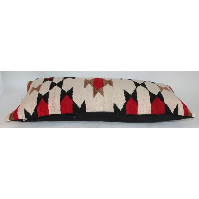 Early saddle blanket weaving bolster pillow in fine condition. This nice geometric design is unusual and the bolster has a...