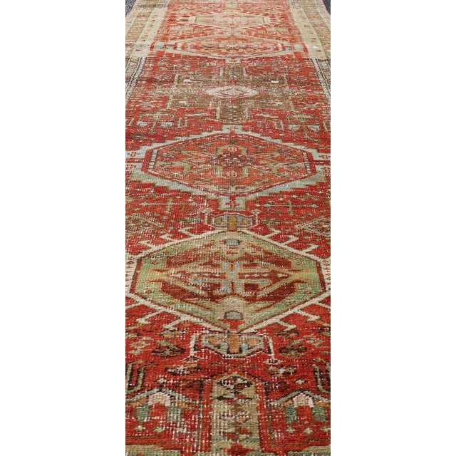 Tribal Antique Persian Heriz Distressed Runner With Geometric Medallions in Soft Colors For Sale - Image 3 of 11