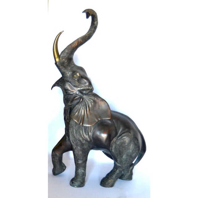 A fantastic bronze 'lost wax' trumpeting elephant. With realistic details and a powerful stance, it is one of the nicest...