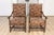 This elegant pair of 20th-century French armchairs exemplifies timeless design and craftsmanship. Constructed from solid...