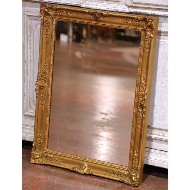 Elevate an entryway, dressing room, or hallway with this elegant antique giltwood mirror crafted in France circa 1880 and...