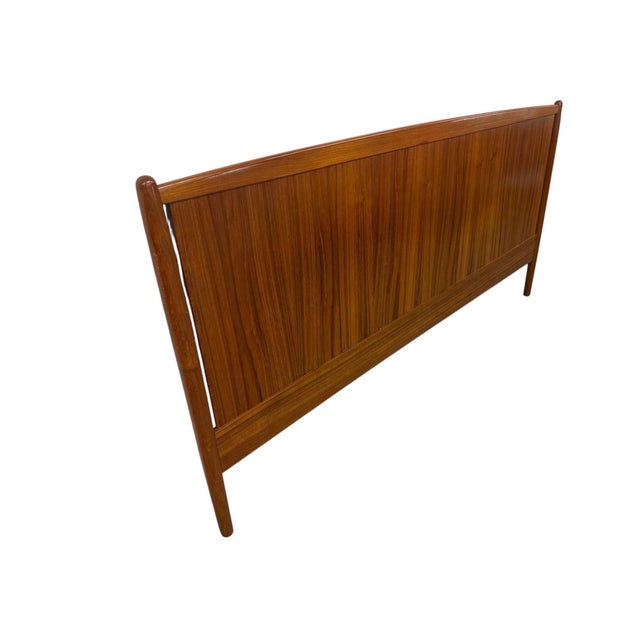 Elevate your bedroom with this exceptional Mid-Century Danish Modern king size teak headboard, crafted in Denmark circa...