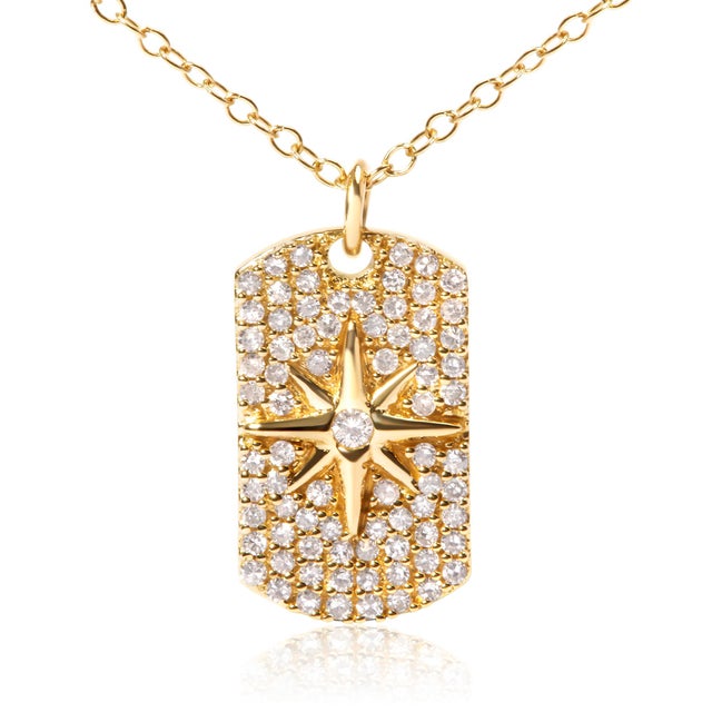 Immerse yourself in the captivating brilliance of the North Star highlighted in this exquisite pendant necklace, where...
