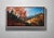 Ralston Fall, 2024 captures the vibrant hues of autumn as fiery oranges and yellows dominate the landscape, contrasting...