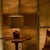 Sourced in Paris, a French Art Deco table lamp from the 1940s carved in wood with a rounded silhouette and hand-worked...