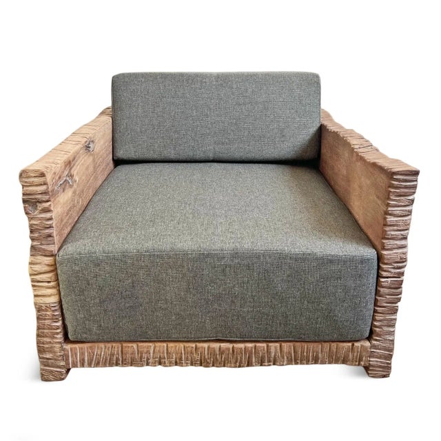 Rustic modern style teak wood cube design club chair. Deep carved scored for unique rustic texture. Teak will vary with...