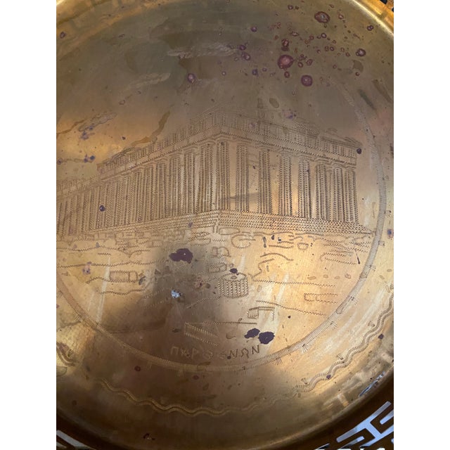 This is a beautiful brass serving tray with Greek key details along the side and handles. This tray would look perfect in...