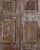 Elevate your interior with these antique carved wood doors featuring bold nail stud detailing and rich hand-carved...