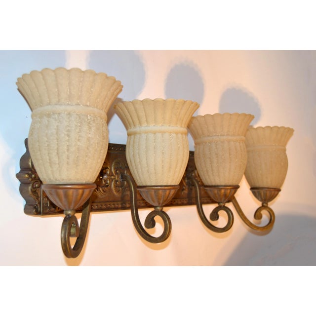 Mid-Century Modern 4 Light Wall Sconce in Bronze Finish with 4 textured frosted tan Glass Shades in Alabaster Look. US...