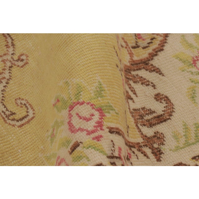 Textile Vintage Distressed Rug in Gold and Rose With Floral Cartouches - Rug & Kilim For Sale - Image 7 of 9
