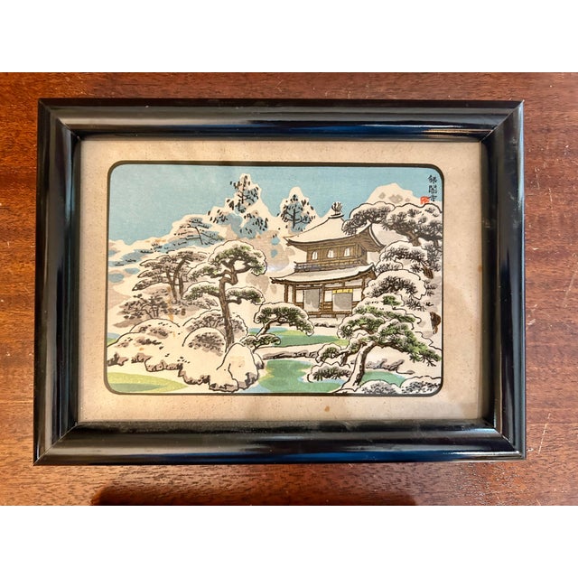 A striking pair of vintage Japanese landscape prints featuring imagery rooted in the traditional ukiyo-e genre. Presented...