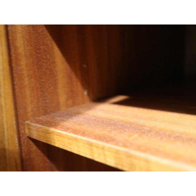 Discover a stunning Danish short credenza by Christian Linneber, expertly crafted in vintage teak to embody true mid...