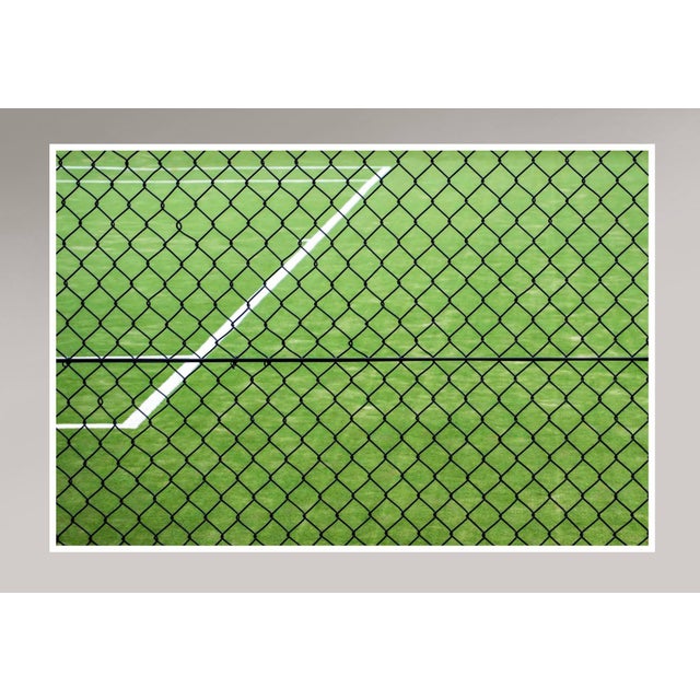 A limited-edition photograph of a grass tennis court by the American art photographer Kimberly Poppe, shot at Boomerang...