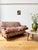 A stunning antique kilim covered two seater sofa with delightfully comfy proportions. Love the patterns, especially the...