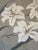 Enhance your interior design project with this fine 6' x 9' hand-knotted Tibetan rug, a singular statement piece that...