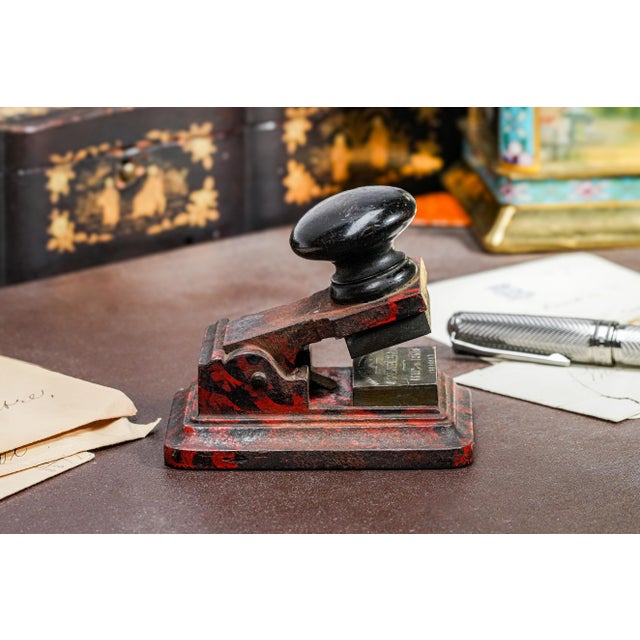 An extraordinary and unusual find, this antique European desk embosser merges industrial charm with old-world...